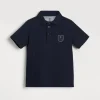 Brunello Cucinelli Poloshirt aus geripptem Baumwolljersey mit Tennis-Badge | Kinder T-shirts & Hemden