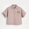 Brunello Cucinelli Poloshirt aus leichtem Stretch-Baumwollsweat mit Precious Flower Crest | Kinder Travelwear